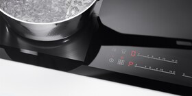 De boostertoets op een inductiekookplaat van Electrolux