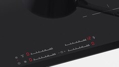 Gros plan des contrôles de cuisson à induction