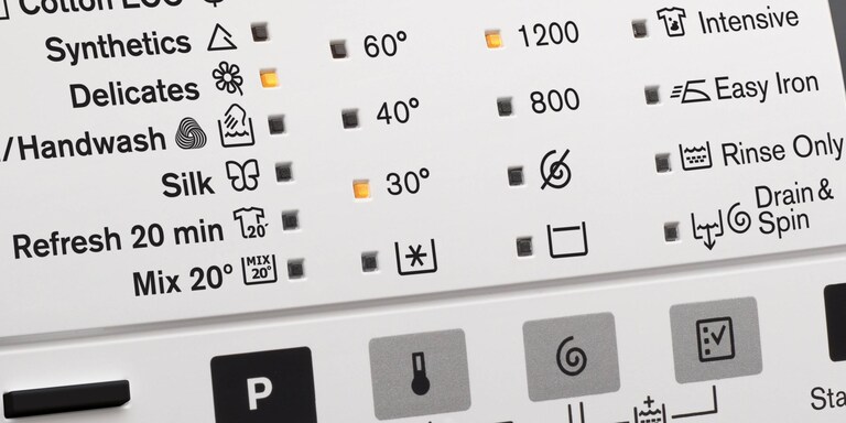 The UltraCare Eco display panel showing a cold wash cycle