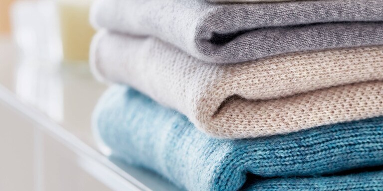 A pile of woollen garments